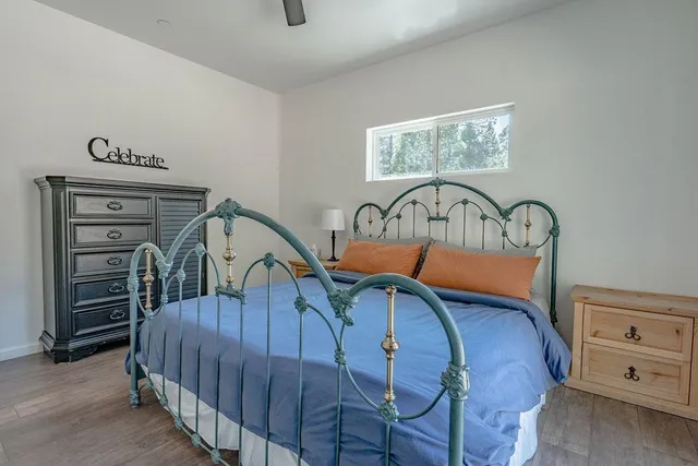 a view of a bedroom with furniture and staircase