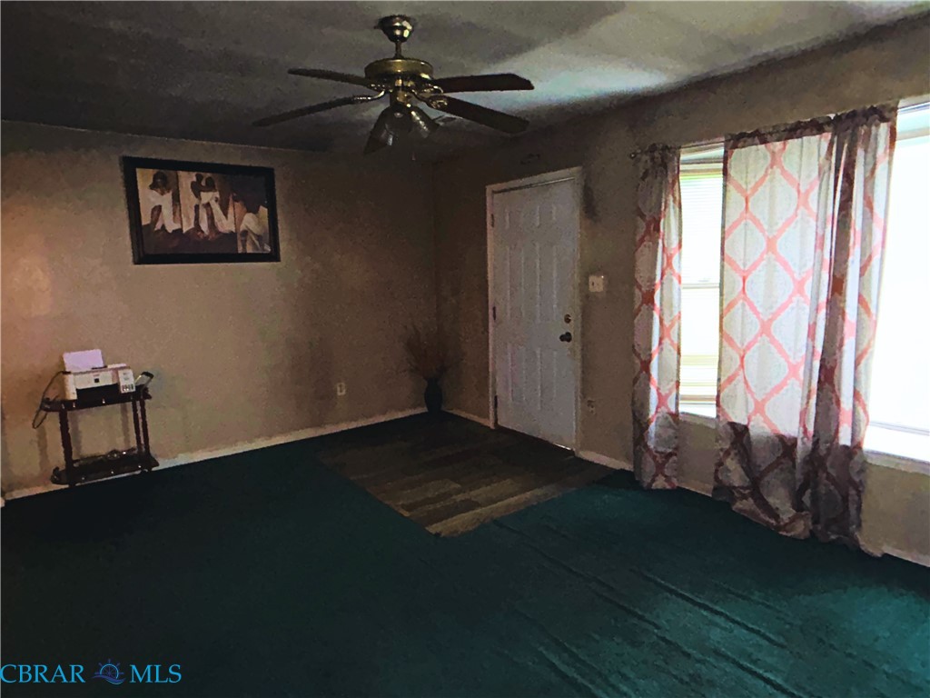 449 Gaskins Road Weems, VA 22576 - Photo 6 of 10 a view of an empty room with a window