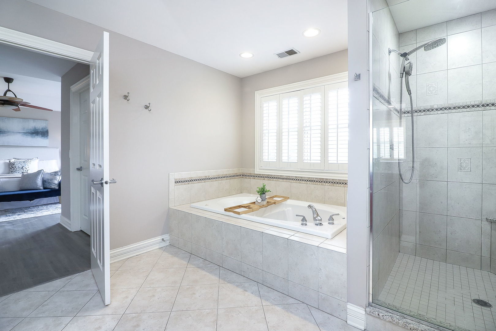 1208 Connamara Court Westmont, IL 60559 - Photo 19 of 36 a bathroom with a tub sink and mirror