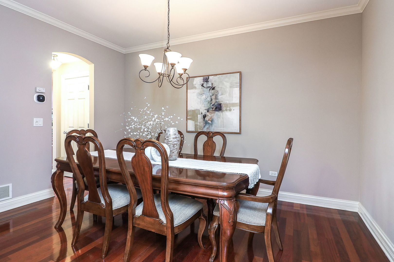 1208 Connamara Court Westmont, IL 60559 - Photo 5 of 36 a view of a dining room with furniture and chandelier