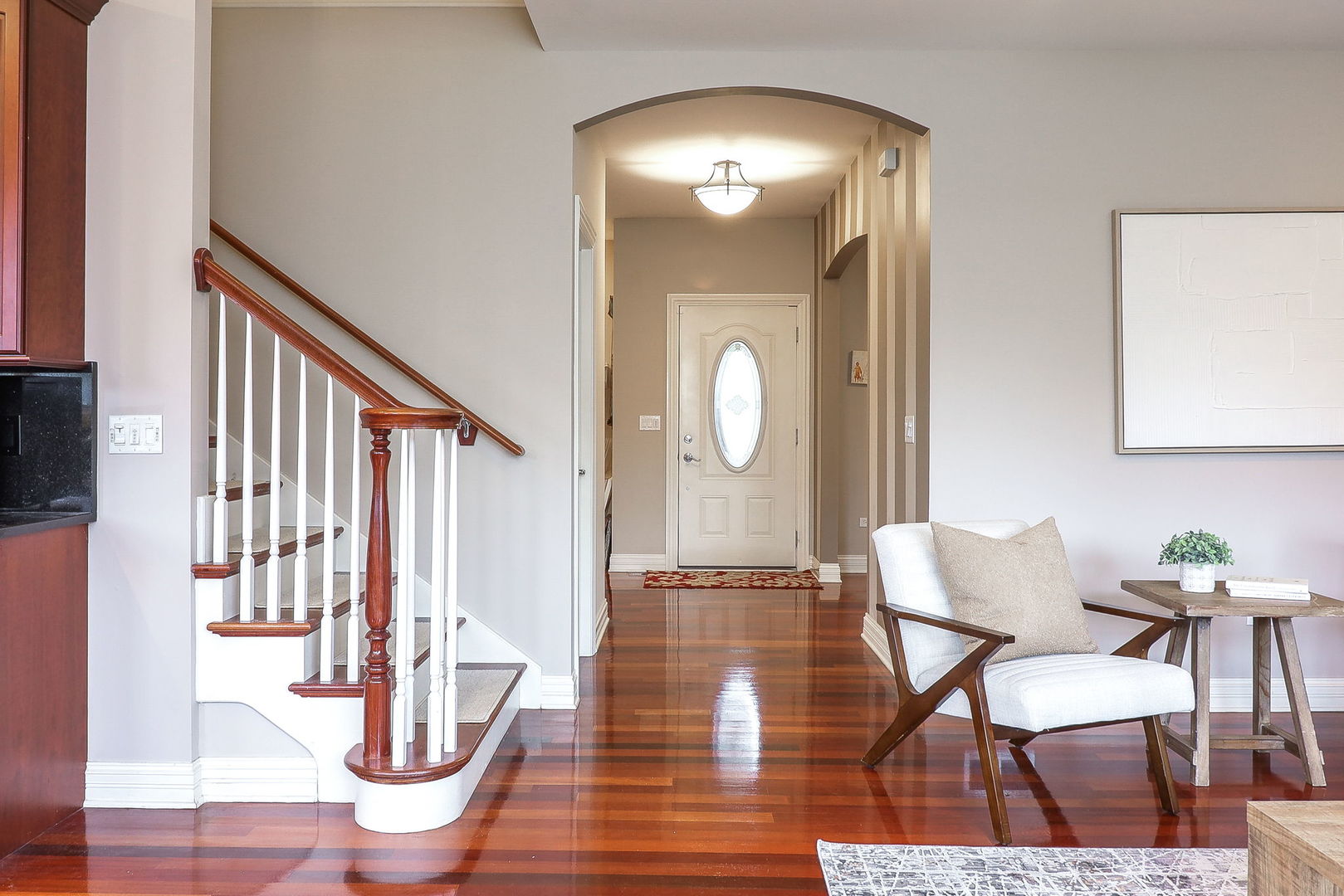 1208 Connamara Court Westmont, IL 60559 - Photo 6 of 36 a view of a livingroom with furniture mirror and wooden floor