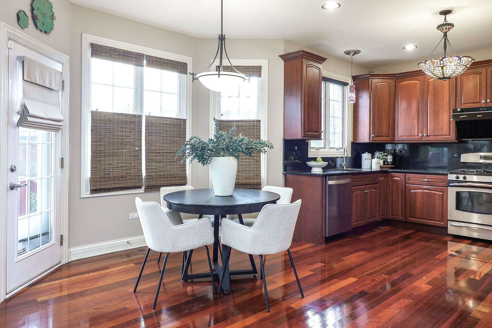 1208 Connamara Court Westmont, IL 60559 - Photo 8 of 36 a view of a dining room with furniture window and wooden floor