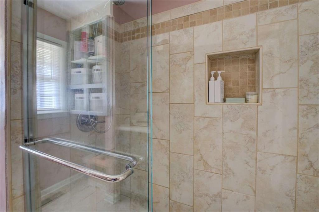 11889 Brown Bridge Road Covington, GA 30016 - Photo 13 of 18 a bathroom with a tub