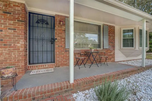 a bench is in front of a house