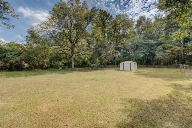 a view of a bathtub with a yard