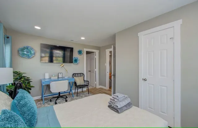 a workspace with furniture and window