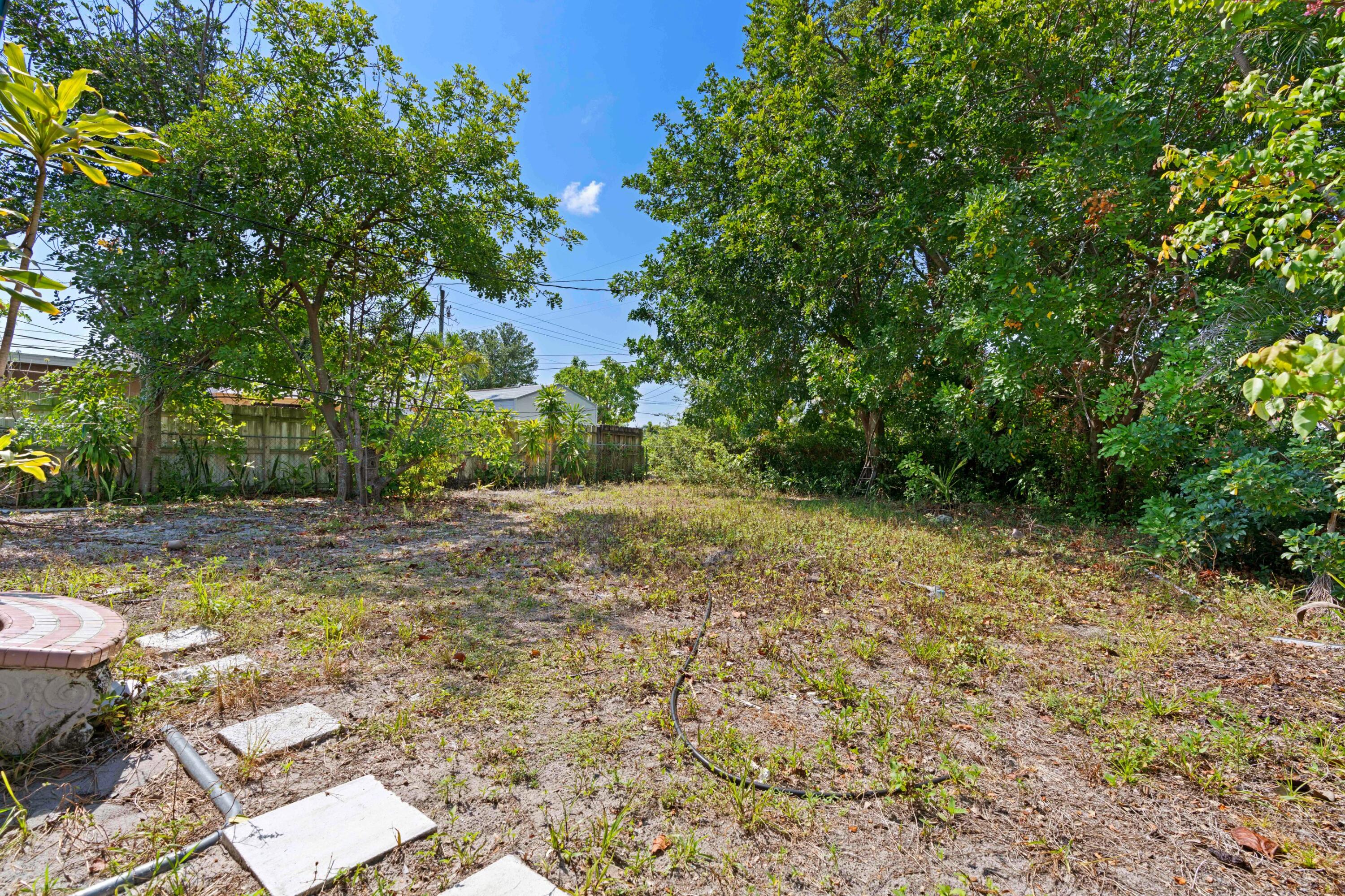 310 Southwest 2nd Street Boca Raton, FL 33432 - Photo 12 of 17 a view of a backyard of the house