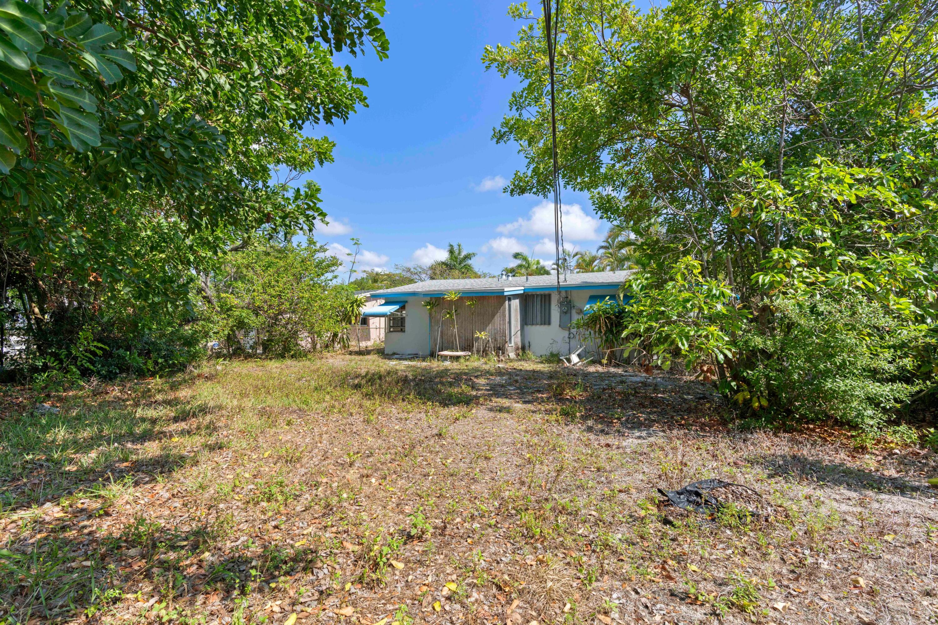 310 Southwest 2nd Street Boca Raton, FL 33432 - Photo 13 of 17 a view of a house with a yard