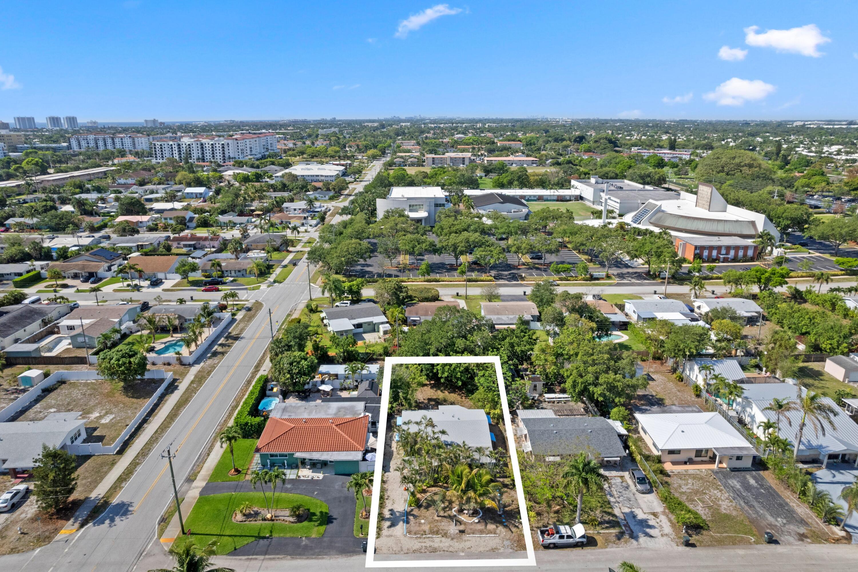 310 Southwest 2nd Street Boca Raton, FL 33432 - Photo 3 of 17 an aerial view of residential houses with outdoor space and street view