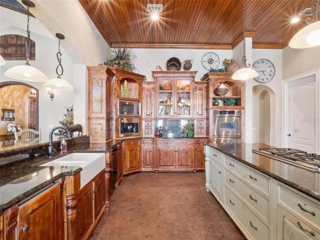 a bed room with a bed and a television