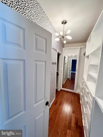 a view of entryway with wooden floor