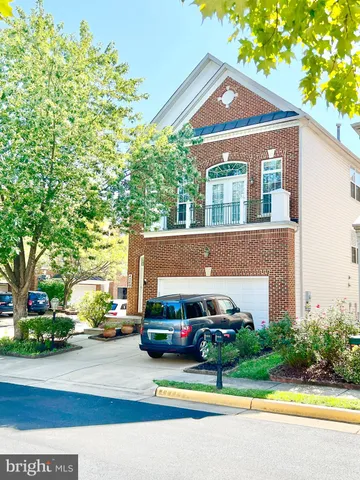 a car parked in front of a house