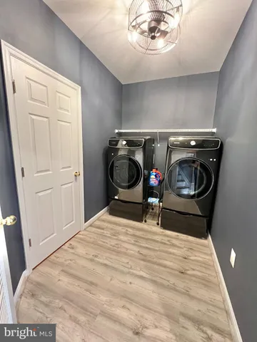 a bedroom with a bed and a mirror