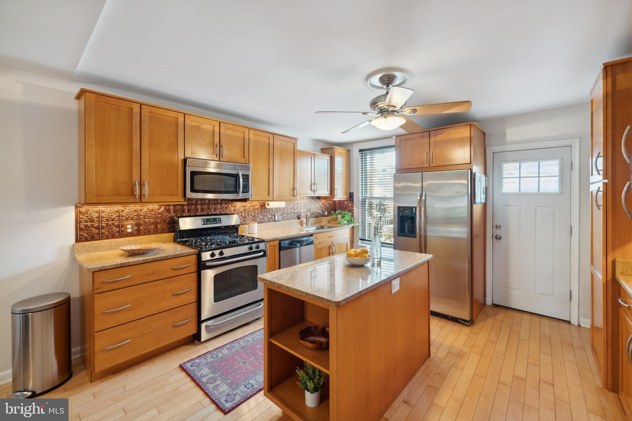 3461 Keswick Road Baltimore, MD 21211 - Photo 14 of 25 a kitchen with a sink appliances and cabinets