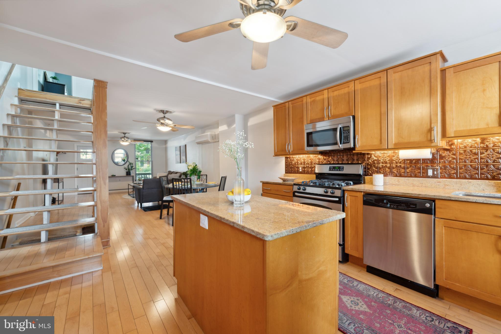3461 Keswick Road Baltimore, MD 21211 - Photo 15 of 25 a kitchen with a stove a sink and a refrigerator