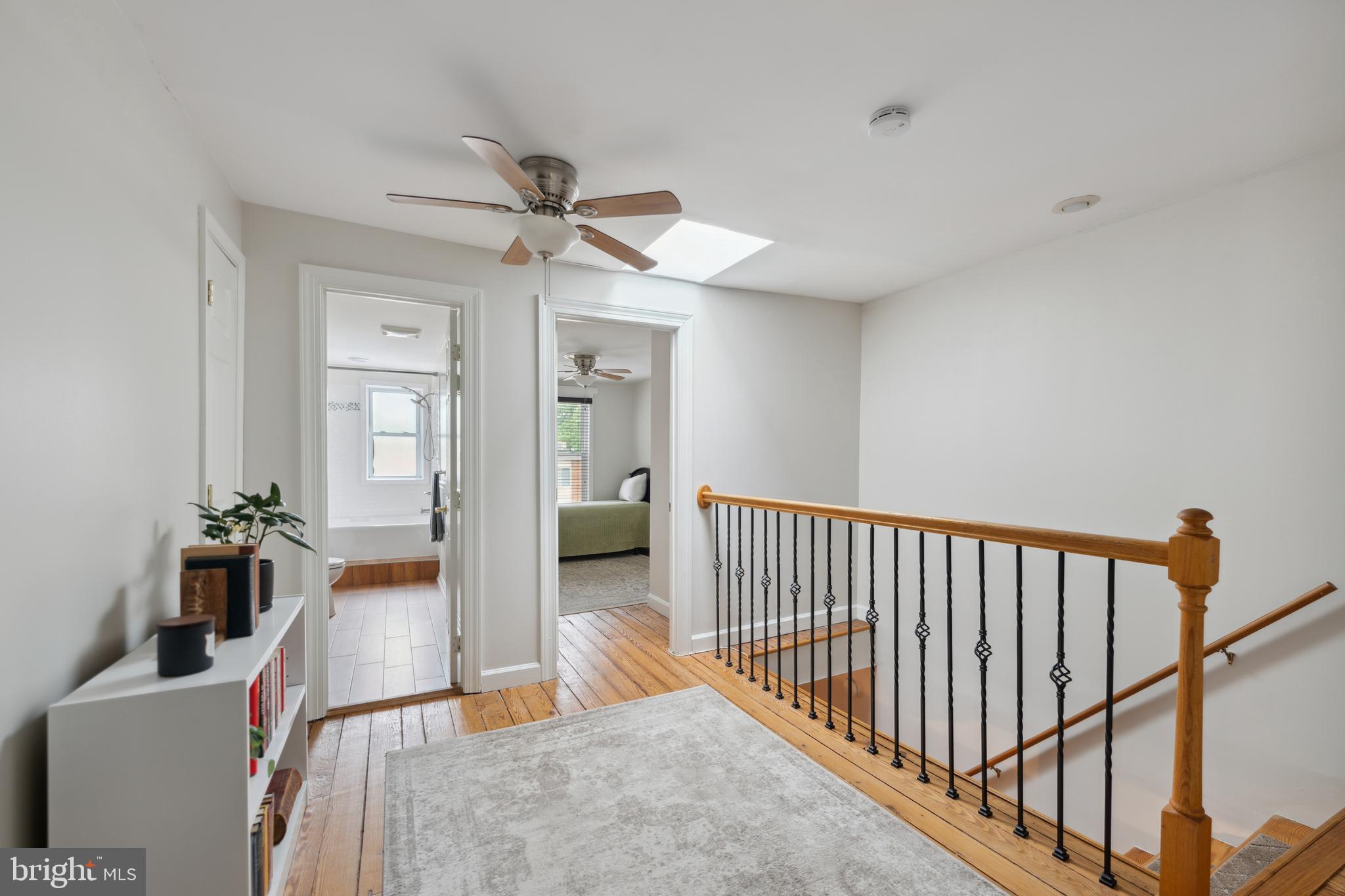 3461 Keswick Road Baltimore, MD 21211 - Photo 20 of 25 a view of a hallway with workspace and living room