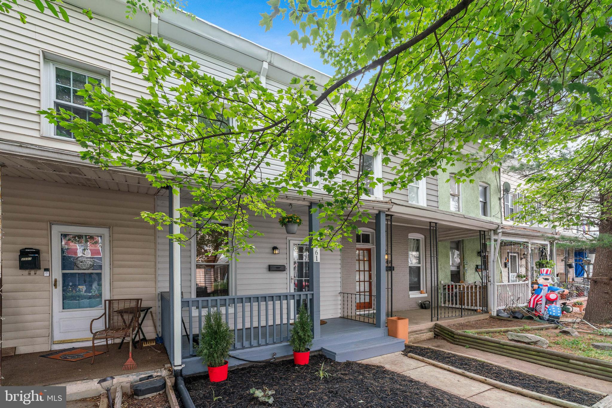 3461 Keswick Road Baltimore, MD 21211 - Photo 2 of 25 a front view of a house with garden