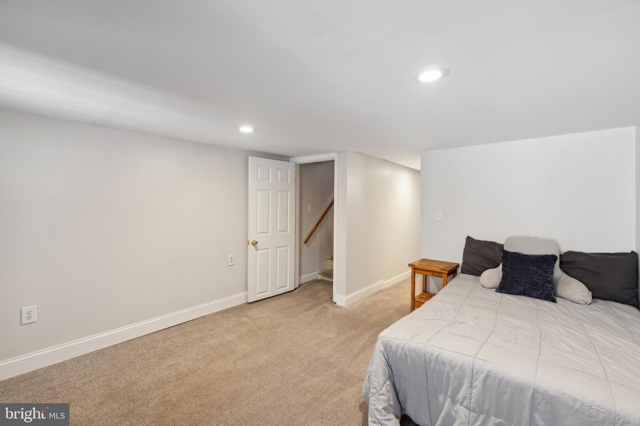 3461 Keswick Road Baltimore, MD 21211 - Photo 5 of 25 a bedroom with bed and window