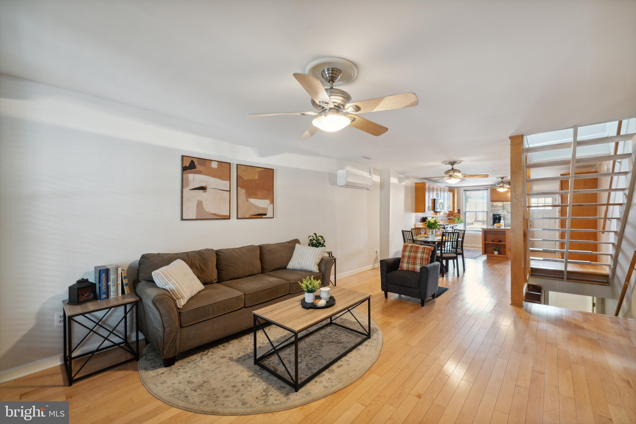 3461 Keswick Road Baltimore, MD 21211 - Photo 9 of 25 a living room with furniture and a large window