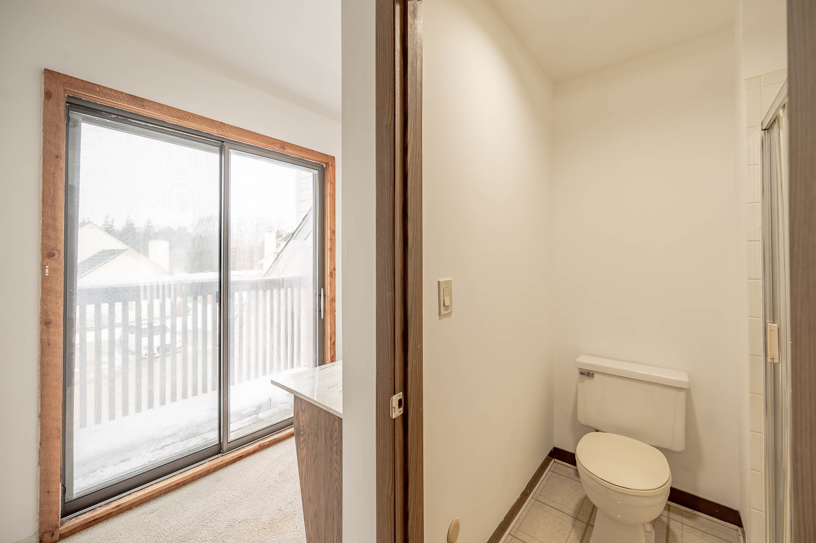 586 Dunham Road Gurnee, IL 60031 - Photo 7 of 13 a white toilet sitting next to a window