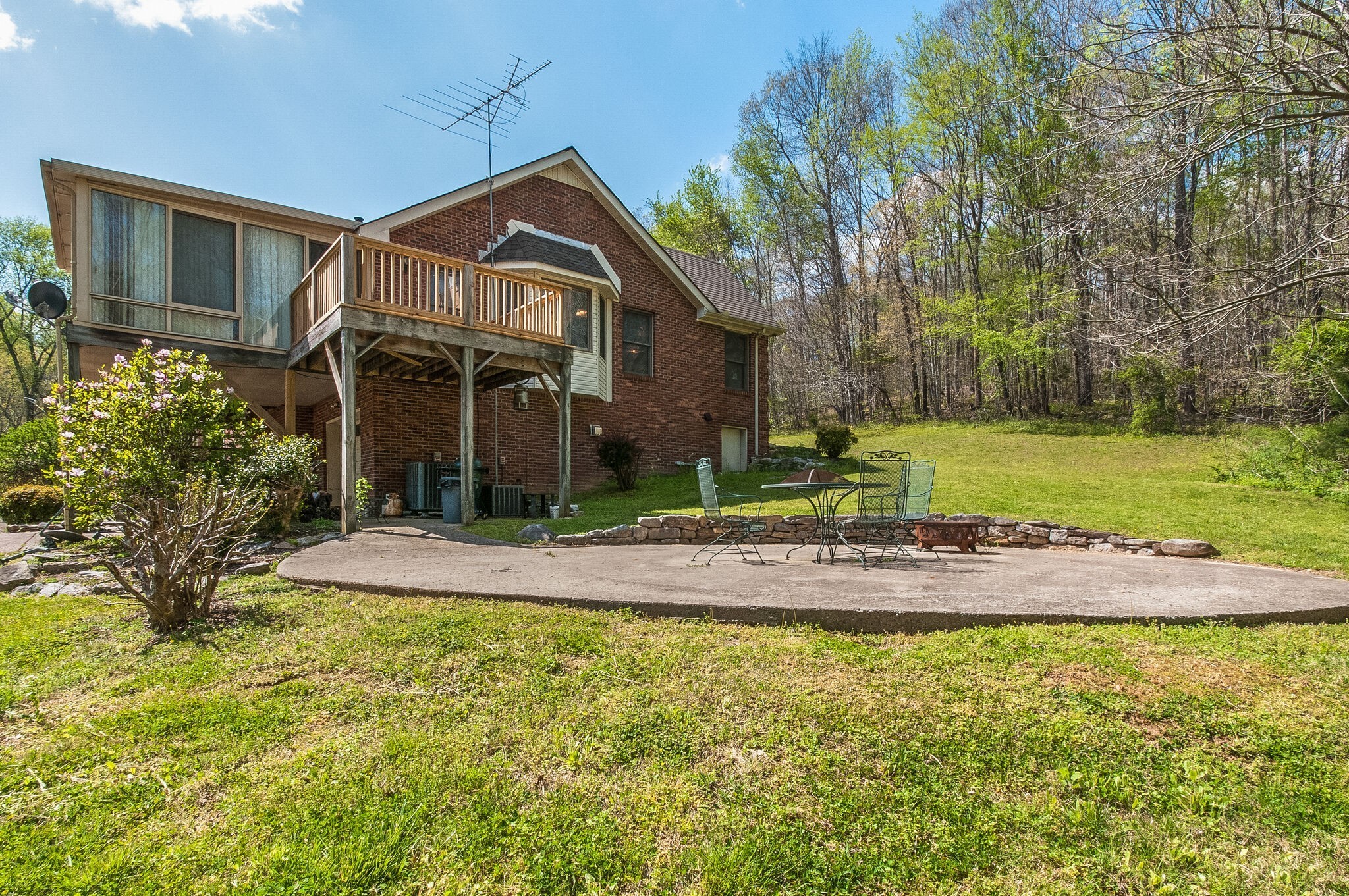 865 Sam Vineyard Road Dickson, TN 37055 - Photo 8 of 42 a front view of a house with a yard