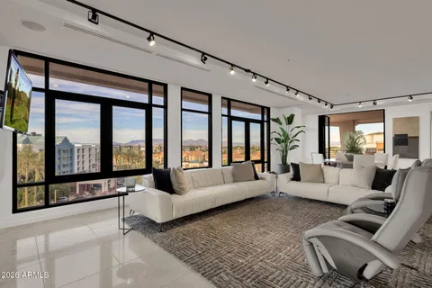 a outdoor living space with furniture and city view