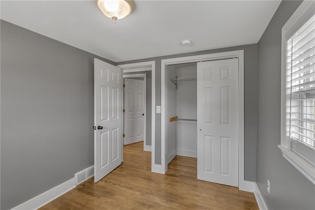 143 Inman Drive New Brighton, PA 15066 - Photo 17 of 29 an empty room with windows and closet