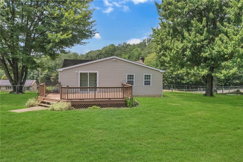 143 Inman Drive New Brighton, PA 15066 - Photo 28 of 29 a view of a house with a yard and sitting area