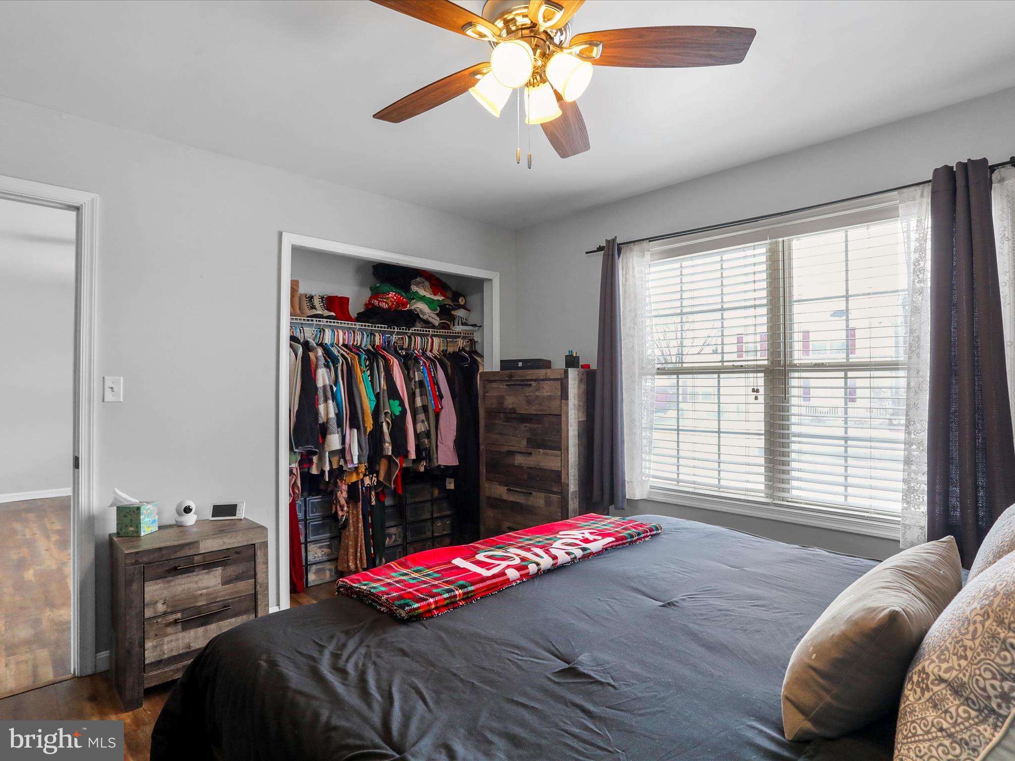 15 Snail Kite Road Martinsburg, WV 25405 - Photo 17 of 37 a bedroom with a bed and a walk in closet