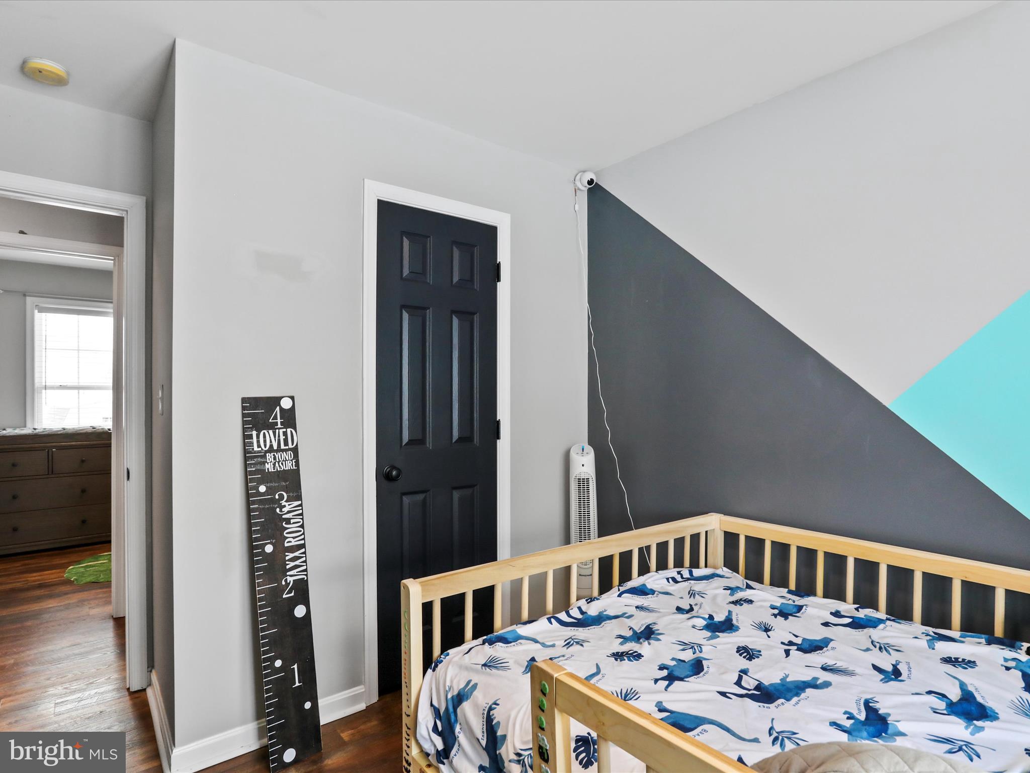 15 Snail Kite Road Martinsburg, WV 25405 - Photo 22 of 37 a bedroom with furniture and a book shelf