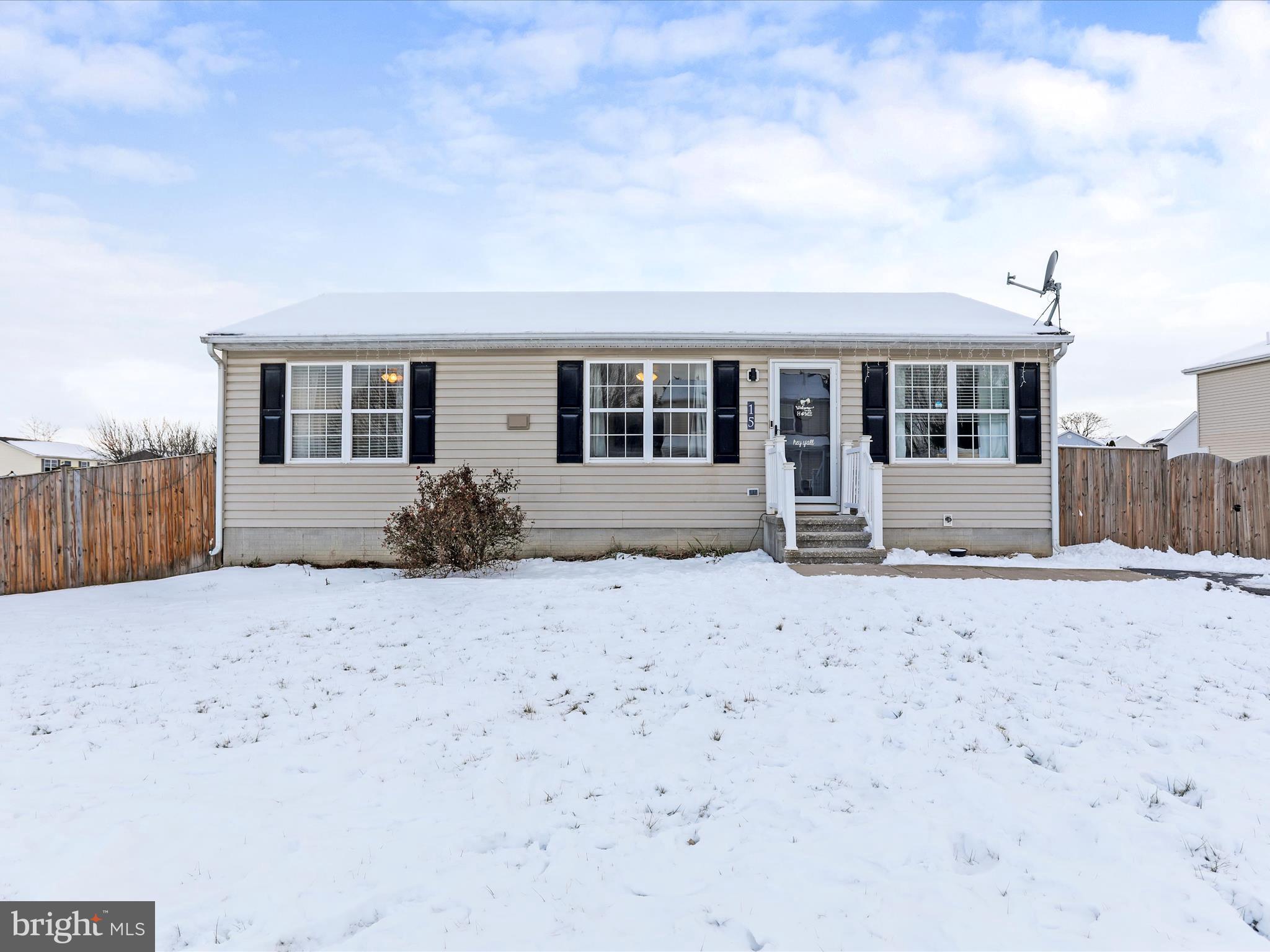15 Snail Kite Road Martinsburg, WV 25405 - Photo 3 of 37 a front view of a house with a yard