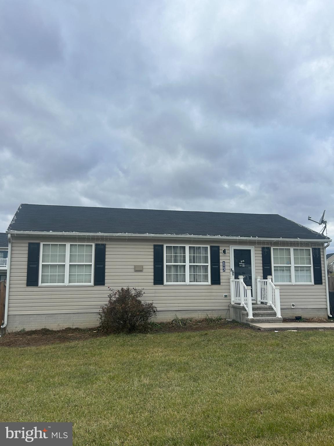 15 Snail Kite Road Martinsburg, WV 25405 - Photo 37 of 37 a front view of a house with garden