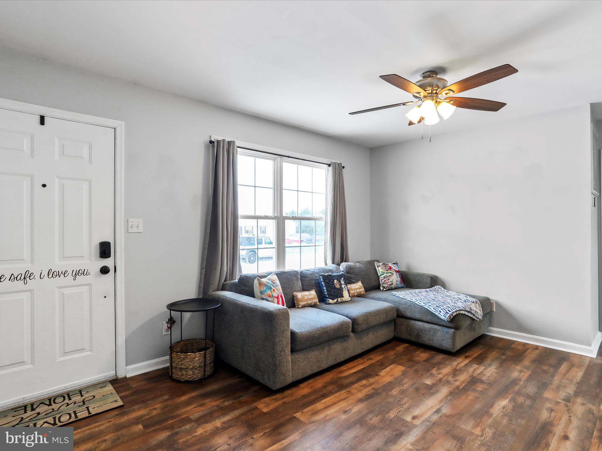 15 Snail Kite Road Martinsburg, WV 25405 - Photo 7 of 37 a living room with furniture and a window