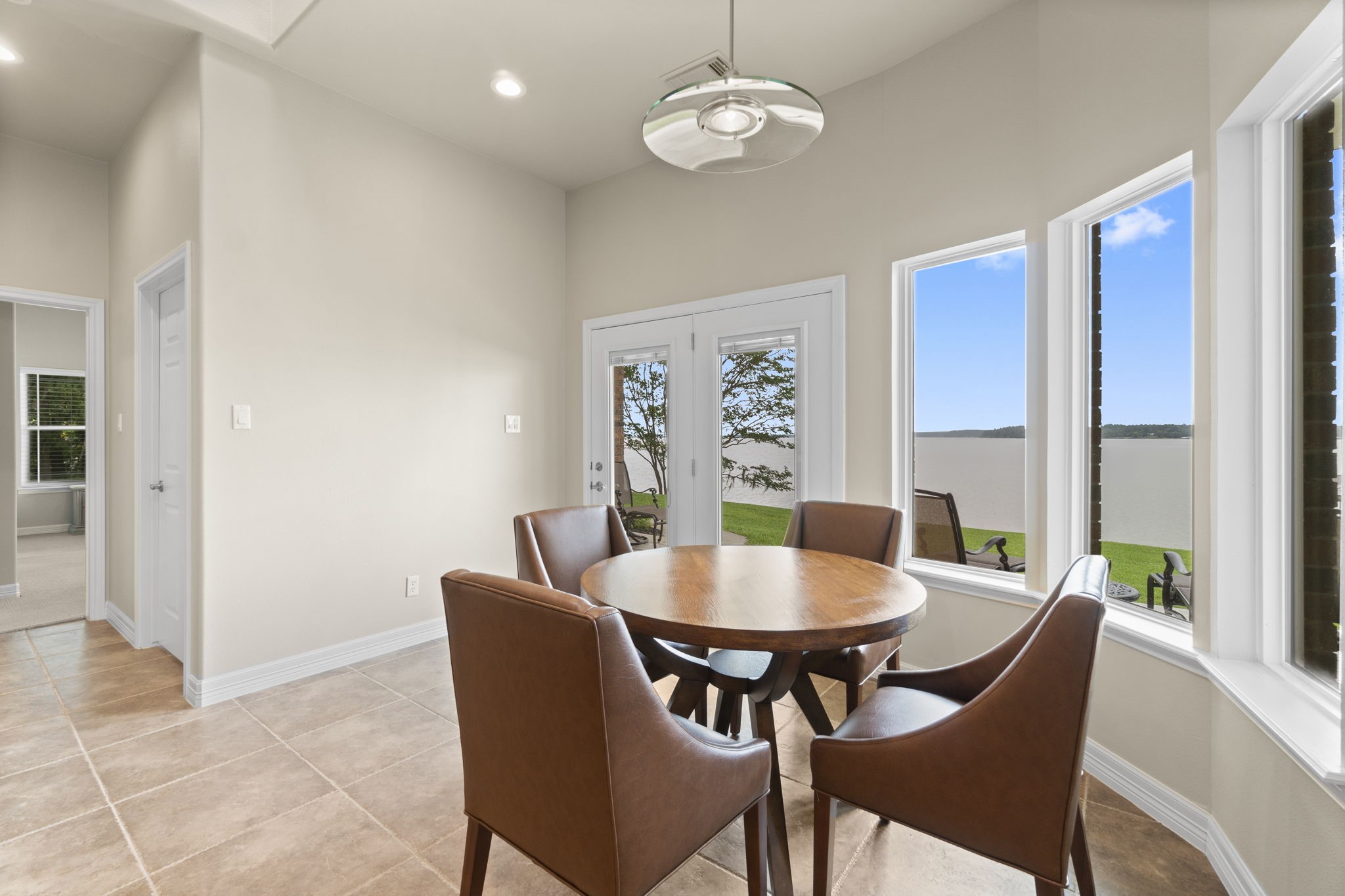 191 Beth Circle Huntsville, TX 77320 - Photo 12 of 50 a view of a dining room with furniture window and wooden floor