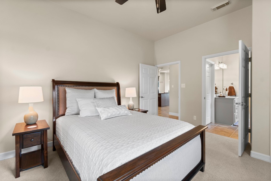 191 Beth Circle Huntsville, TX 77320 - Photo 26 of 50 This spacious guest suite offers both comfort and convenience, featuring a large closet and private ensuite access to a full bathroom, perfect for giving guests a little extra privacy during their stay.