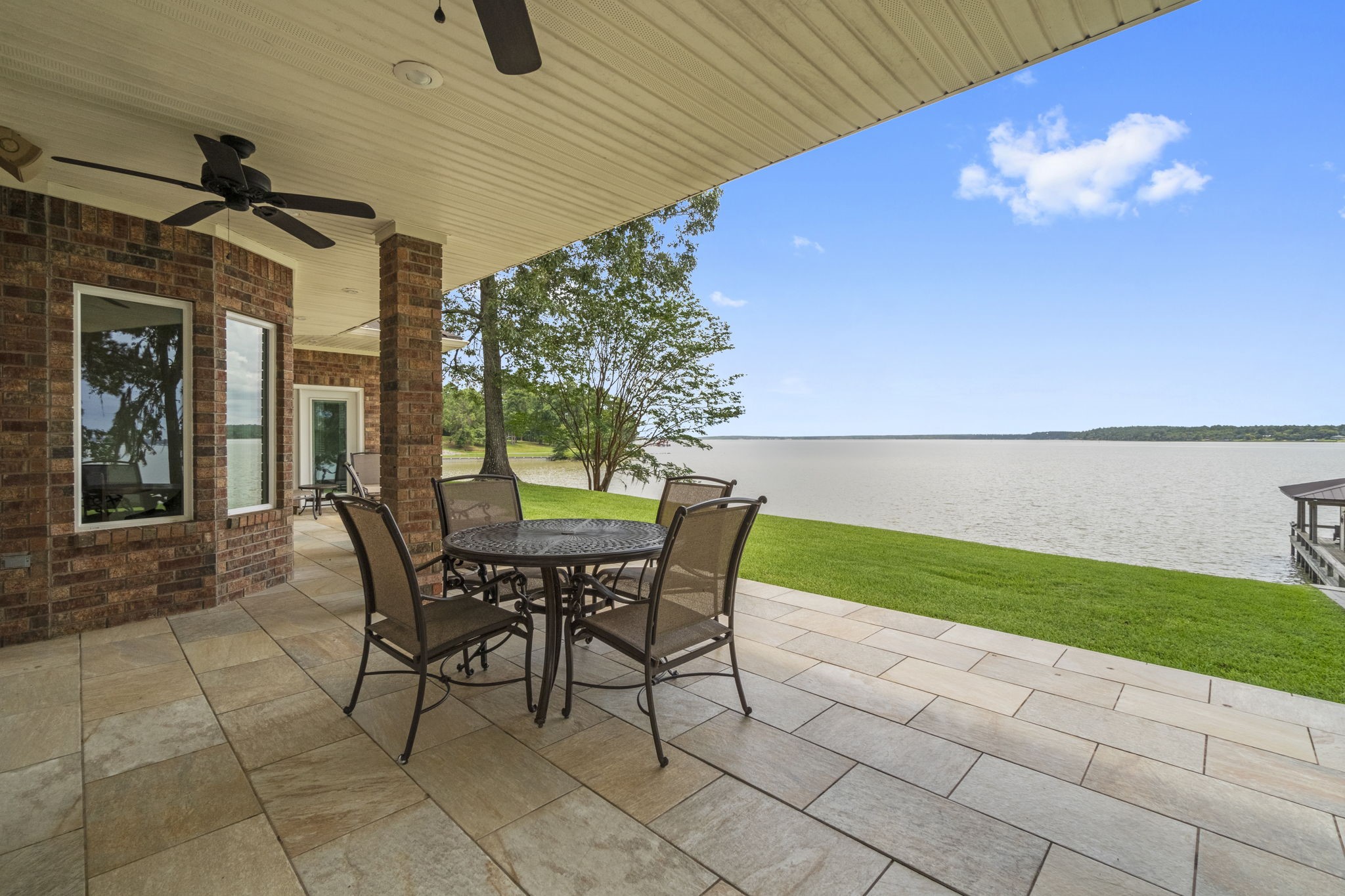 191 Beth Circle Huntsville, TX 77320 - Photo 33 of 50 a view of a patio with table and chairs and potted plants