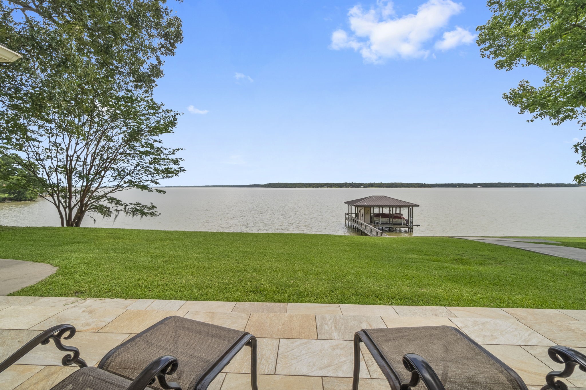 191 Beth Circle Huntsville, TX 77320 - Photo 35 of 50 a view of a backyard with a garden and entertaining space