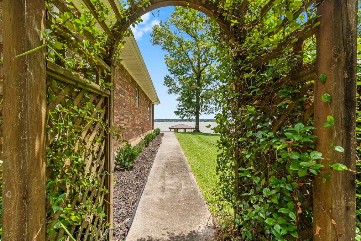 191 Beth Circle Huntsville, TX 77320 - Photo 40 of 50 a view of a pathway of a building