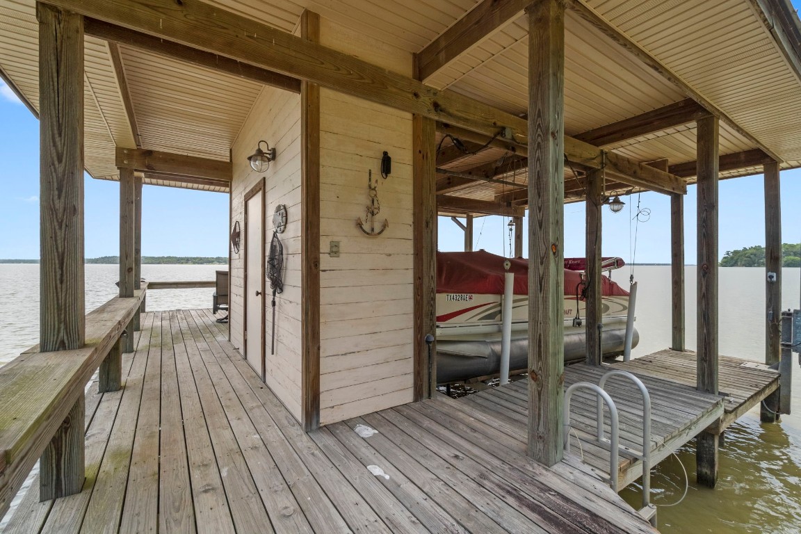 191 Beth Circle Huntsville, TX 77320 - Photo 44 of 50 a view of balcony and deck with wooden floor