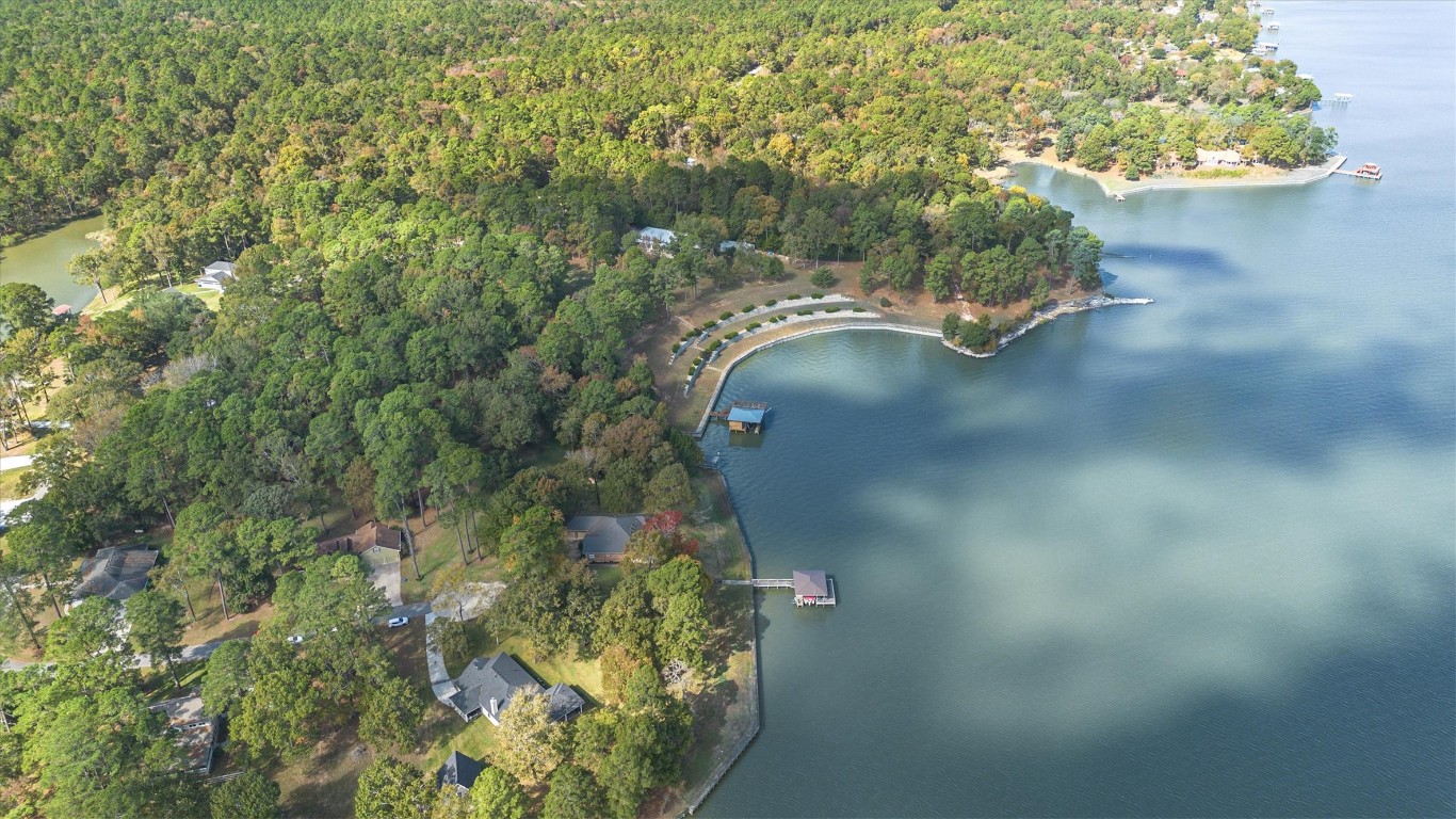 191 Beth Circle Huntsville, TX 77320 - Photo 50 of 50 Ideally located on the banks of Lake Livingston, this serene waterfront retreat is less than 30 minutes from grocery stores, dining, and major conveniences in Trinity, Riverside, and Huntsville. Here, you can enjoy
peaceful waterfront living without sacrificing everyday ease.