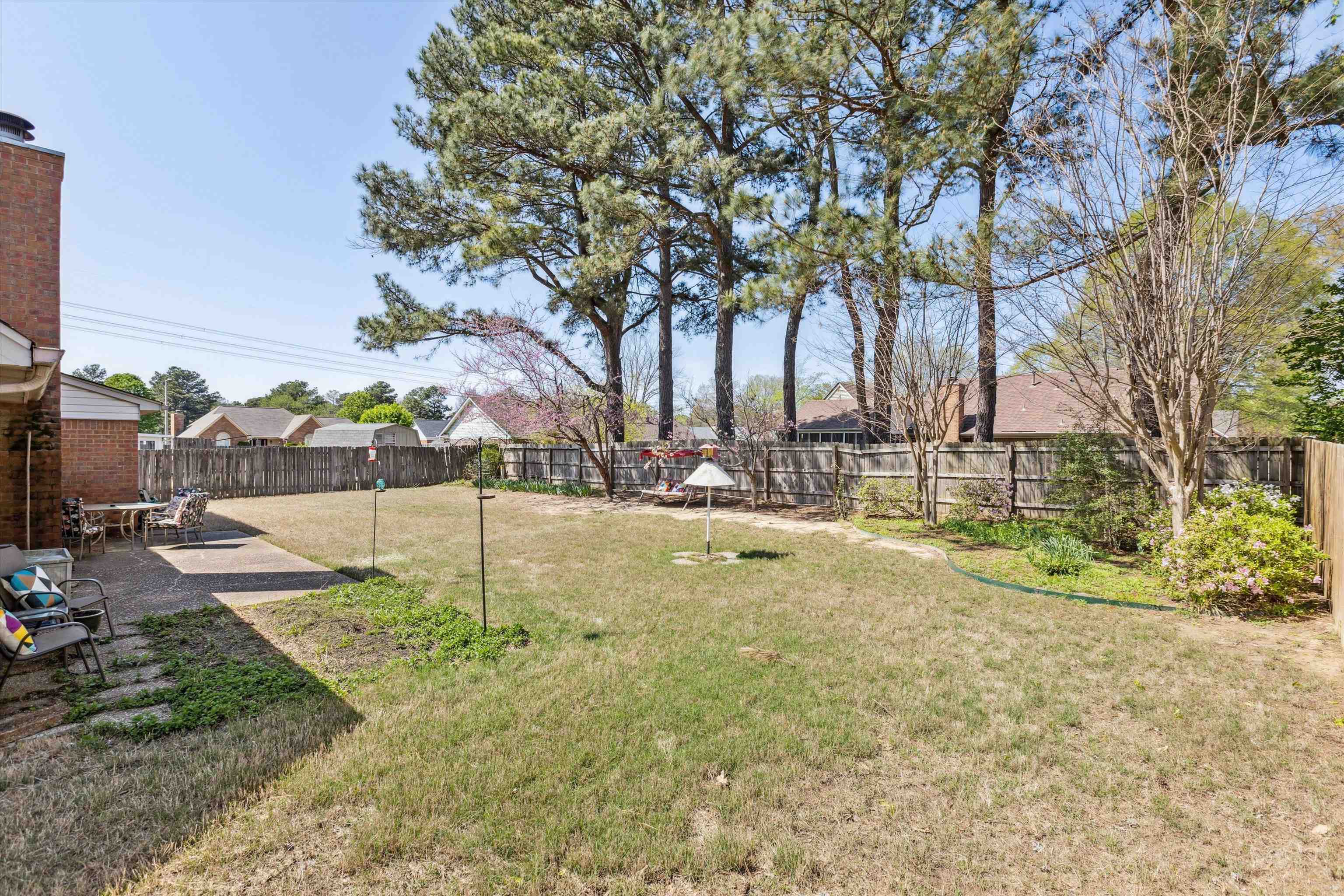 6972 Crestridge Road Memphis, TN 38119 - Photo 24 of 26 View of yard with a fenced backyard and a patio