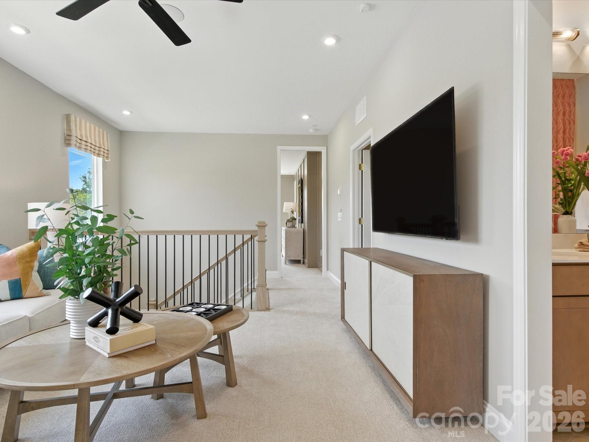 412 Nash Street Fort Mill, SC 29715 - Photo 14 of 21 a living room with furniture and a flat screen tv