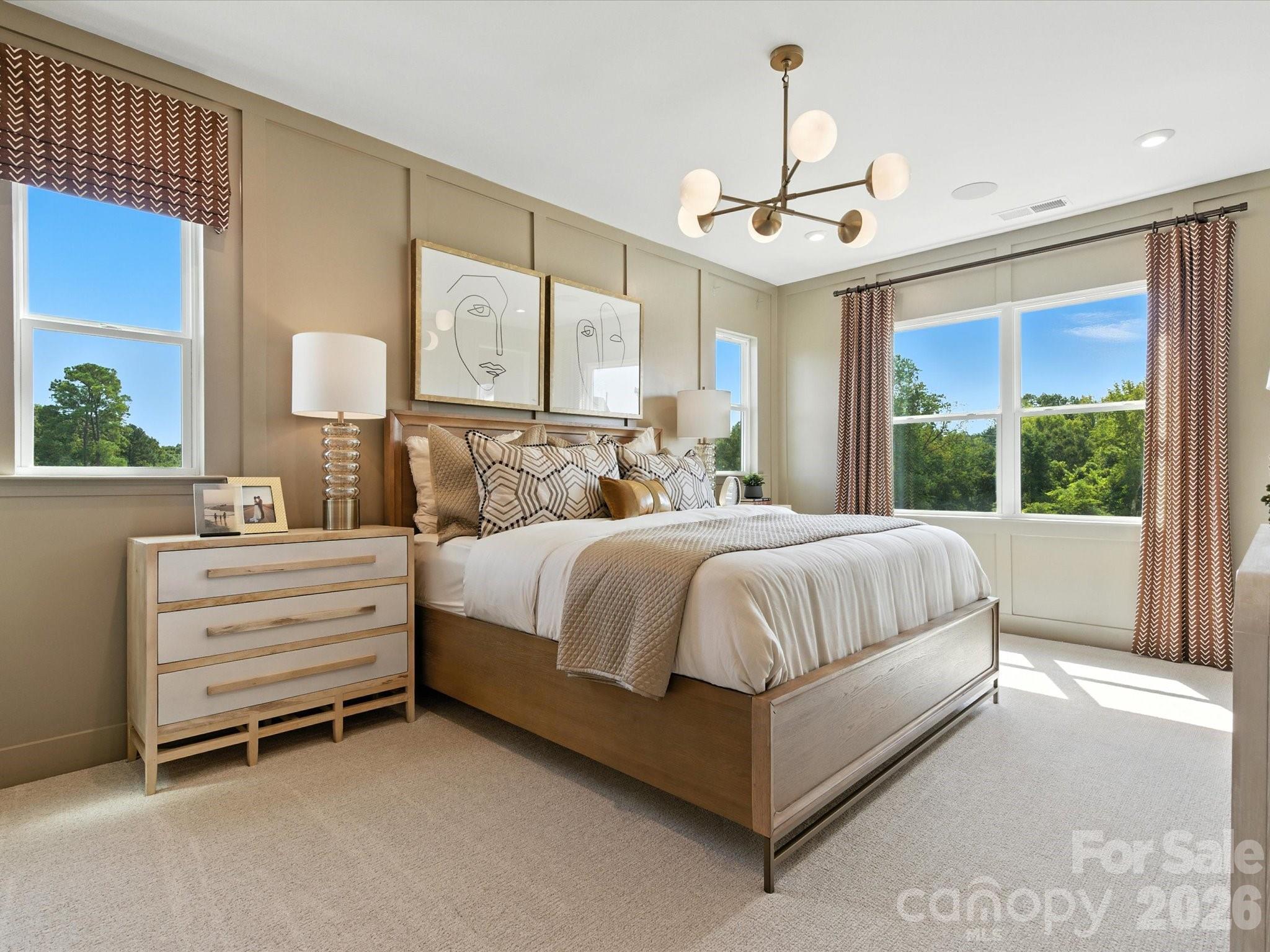 412 Nash Street Fort Mill, SC 29715 - Photo 15 of 21 a bedroom with a large bed and large window