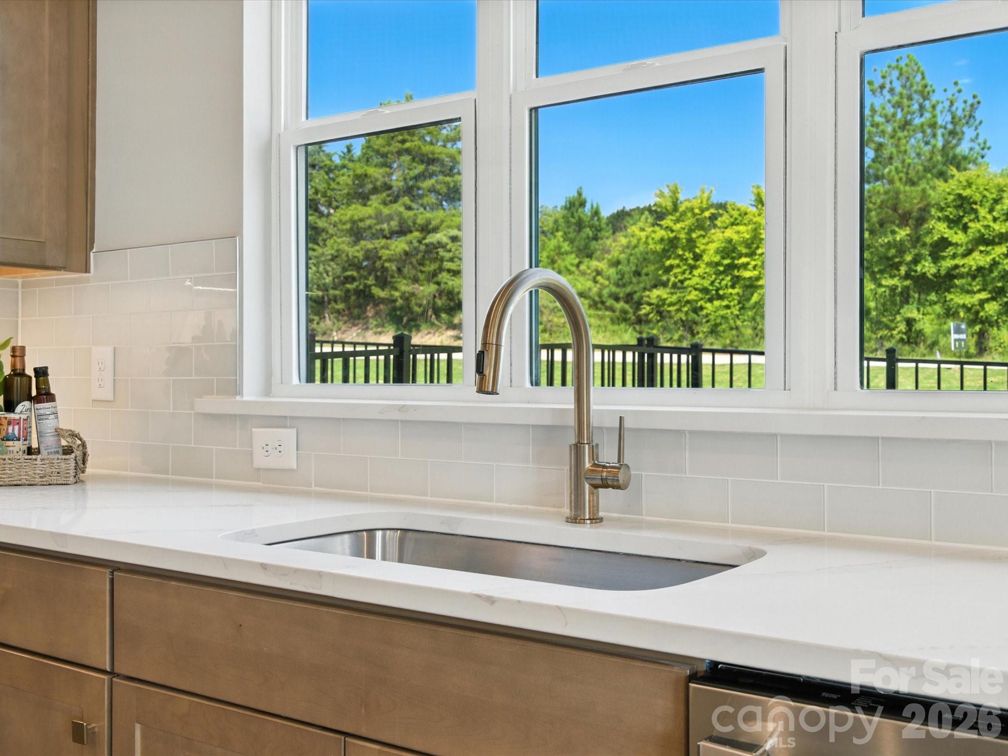 412 Nash Street Fort Mill, SC 29715 - Photo 10 of 21 a kitchen with a sink and large window