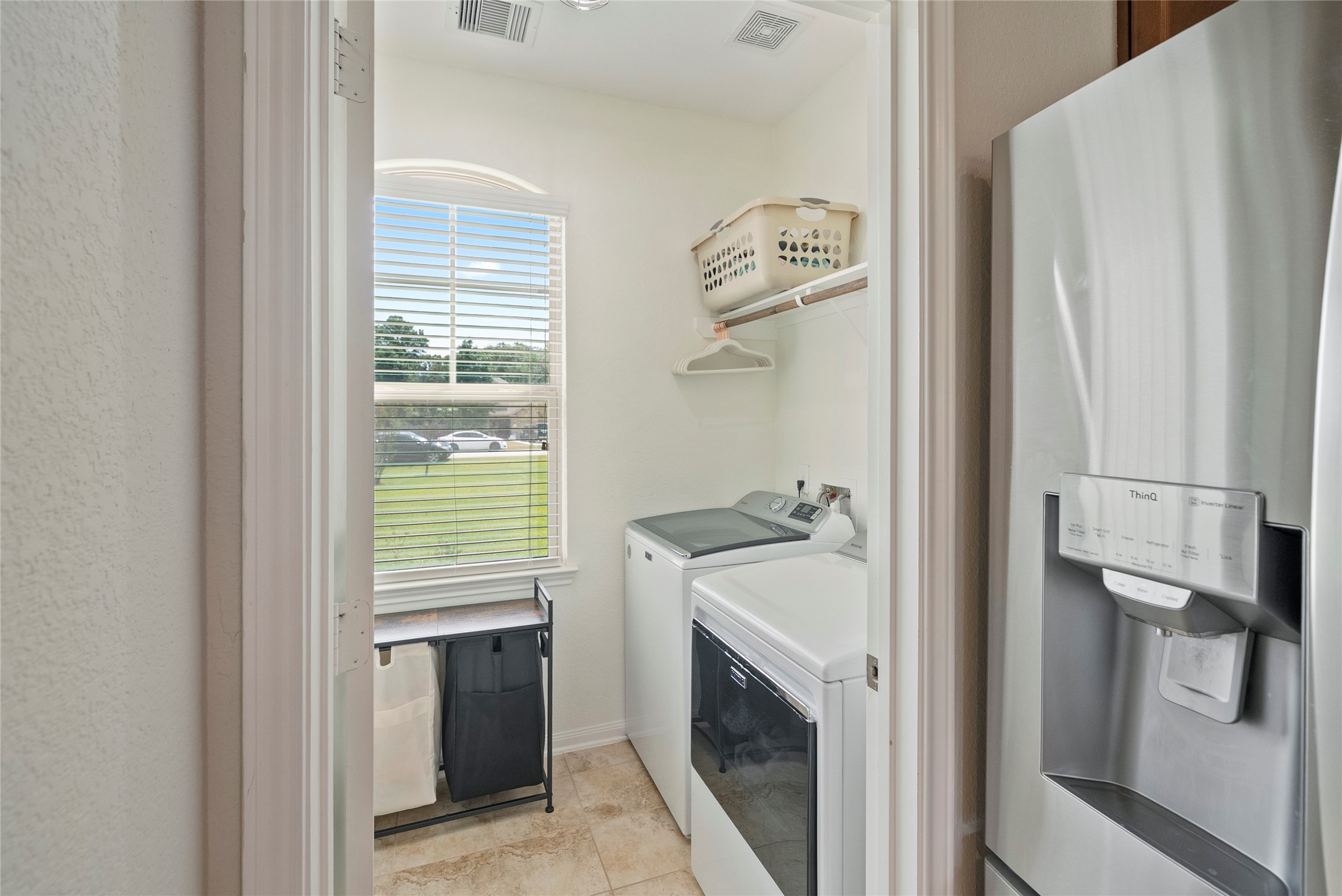 9160 Wapiti Trail Conroe, TX 77303 - Photo 11 of 48 Spacious laundry Room with generous storage space.