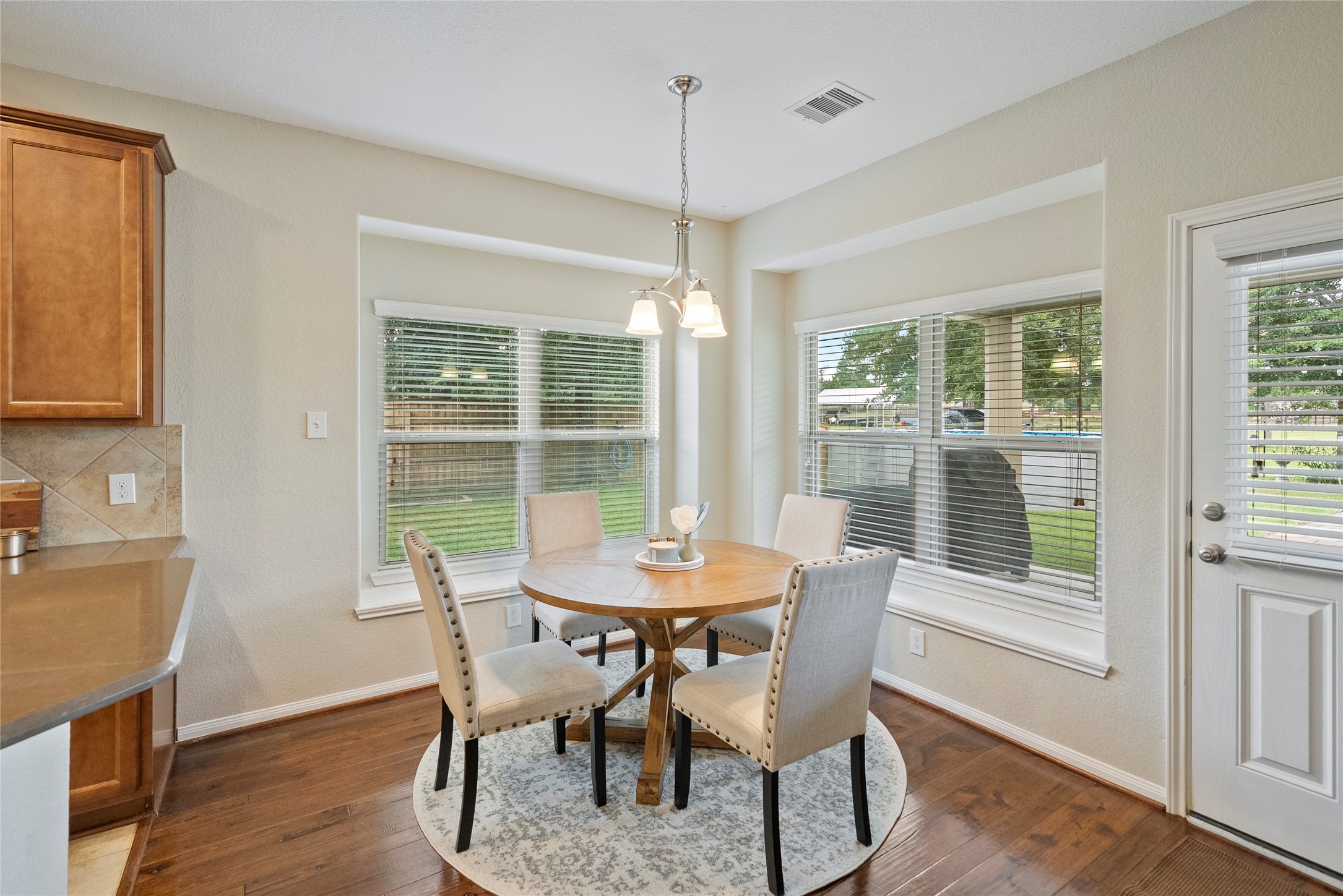 9160 Wapiti Trail Conroe, TX 77303 - Photo 14 of 48 Bright breakfast are overlooking your backyard oasis.