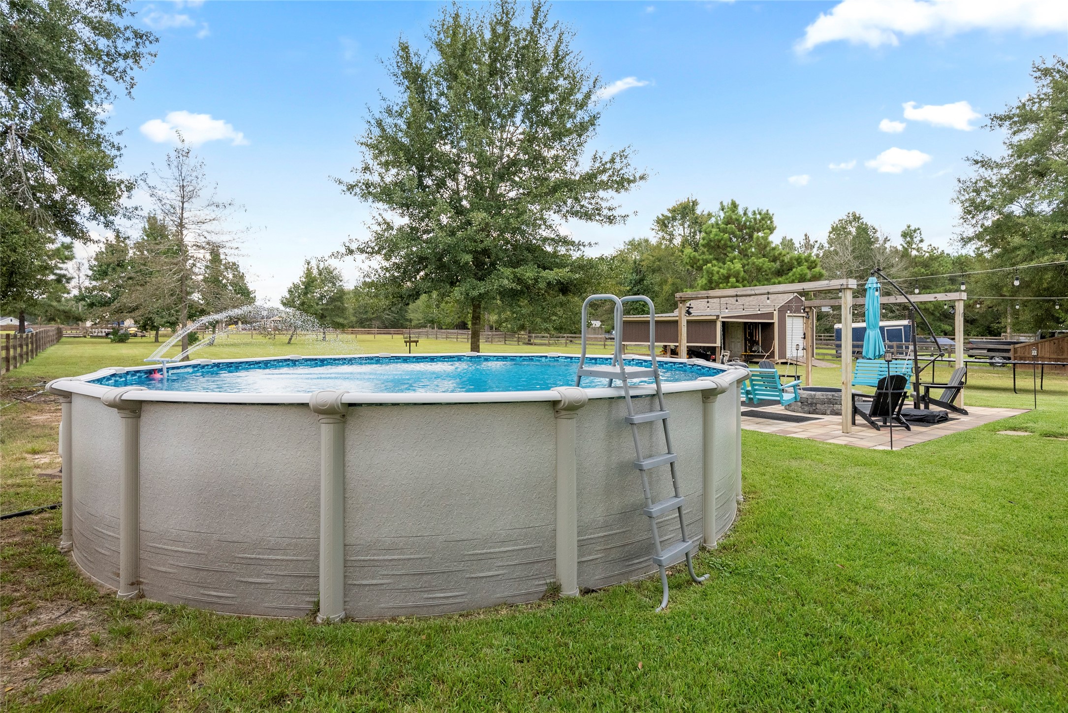 9160 Wapiti Trail Conroe, TX 77303 - Photo 30 of 48 Durable above ground pool with pump and circulation system. Perfect for summer fun.