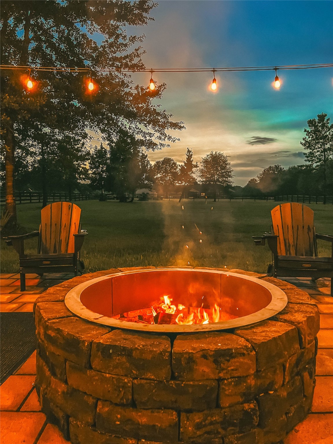 9160 Wapiti Trail Conroe, TX 77303 - Photo 47 of 48 Fire pit nights the perfect spot for family and friends.