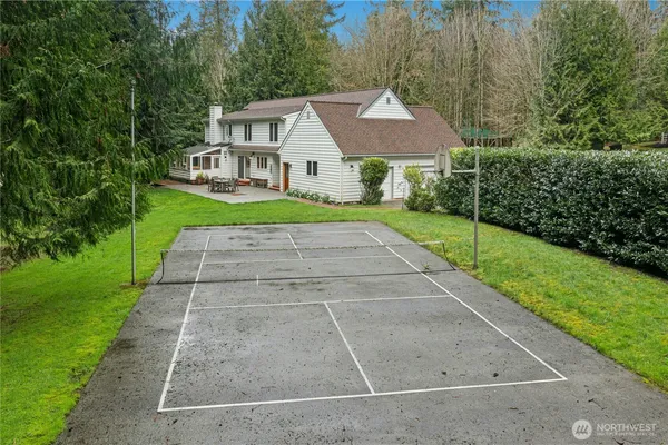 a front view of a house with yard