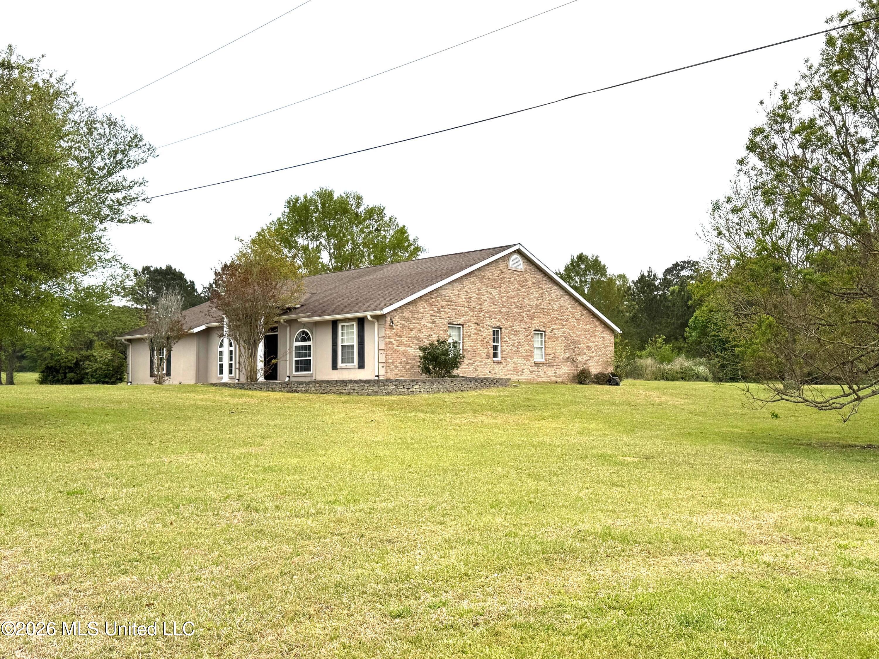 1038 Deerfield Road Summit, MS 39666 - Photo 1 of 32 West side